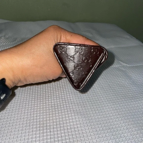 brown leather monogrammed foldable eyeglasses case from Gucci. - Picture 15 of 16